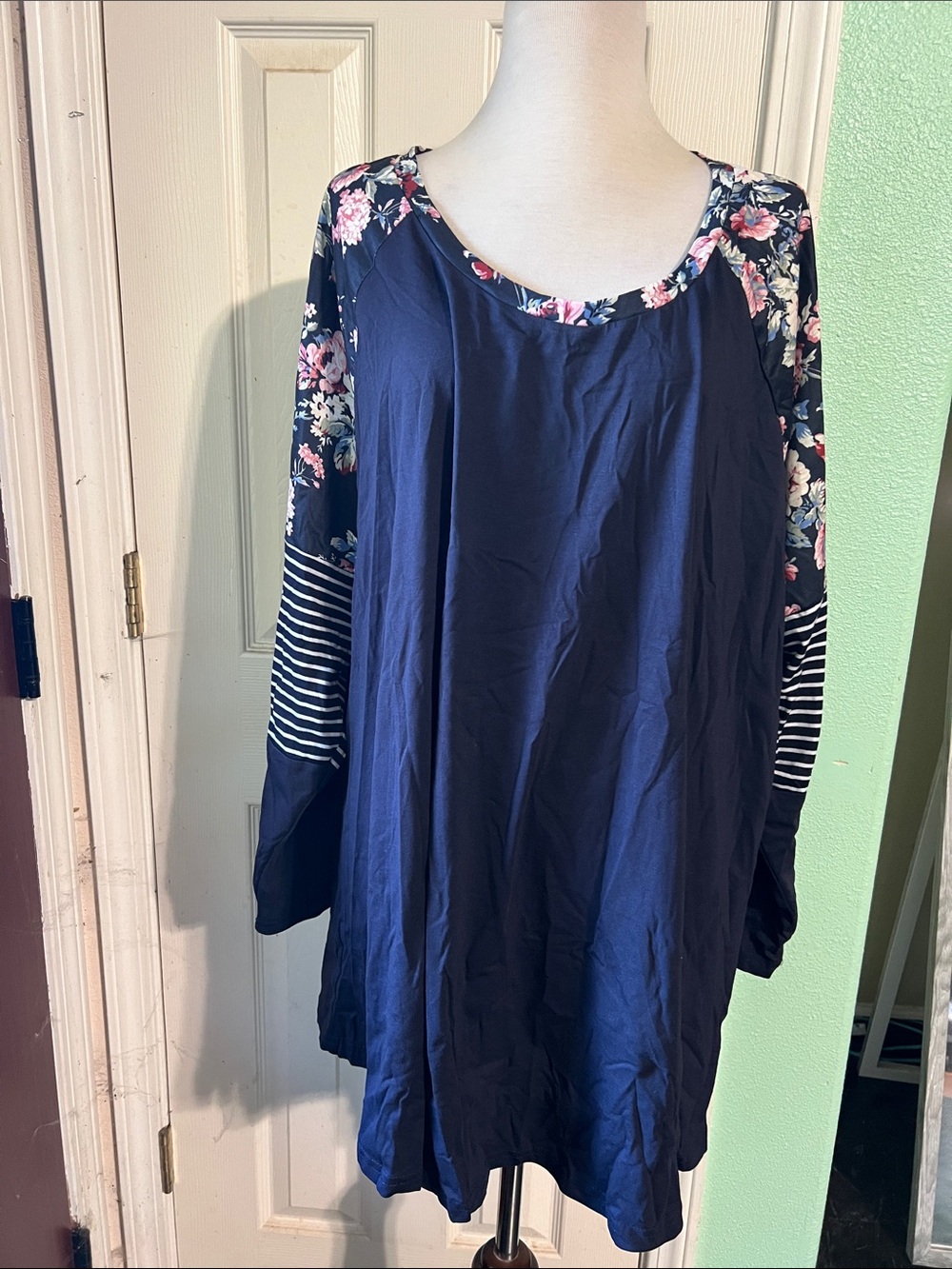 BloomChic Navy Tunic with Floral Raglan Sleeves and Striped Cuffs